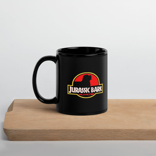 Black 11 ounce mug with Jurassic Bark symbol with the outline of a big dog