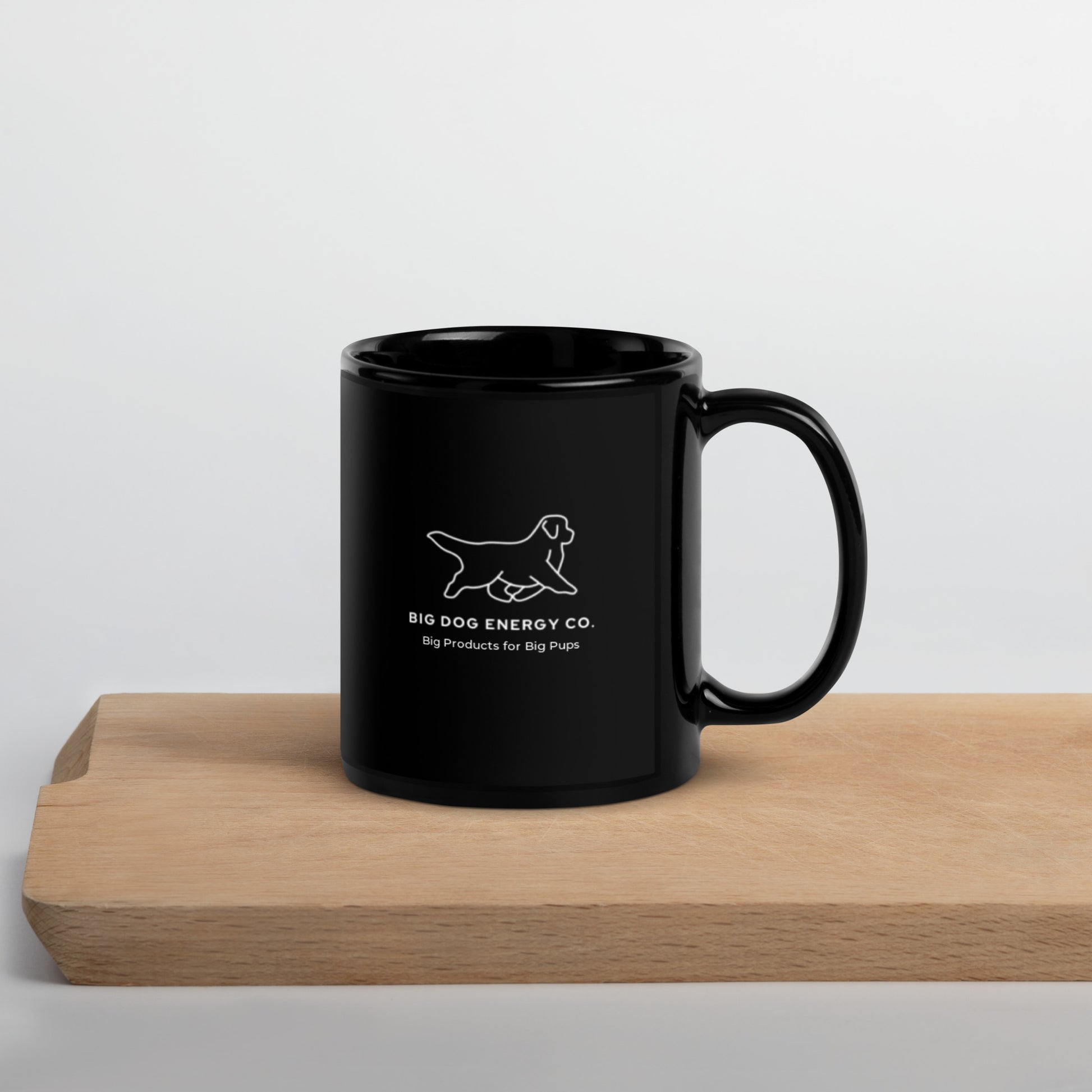 Back side of black 11 ounce mug with Big Dog Energy Company logo and the slogan "Big Products for Big Pups" underneath it