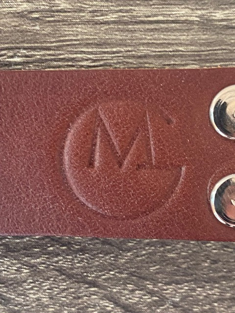 Embossed symbol on 1 inch wide brown leather Mimi Green dog collar for big and giant dogs with necks between 24 and 28 inches