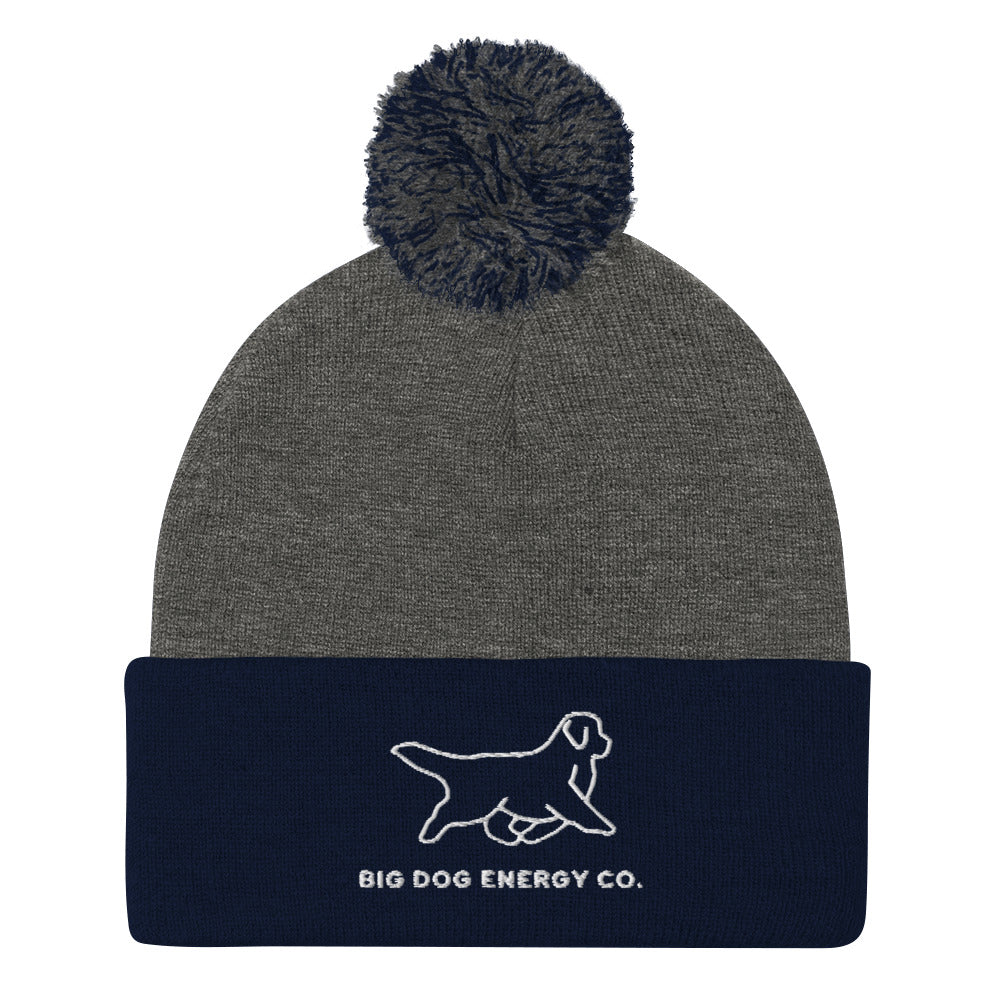 Dark heather grey beanie with dark heather grey and navy pom and navy cuff with Big Dog Energy Company logo