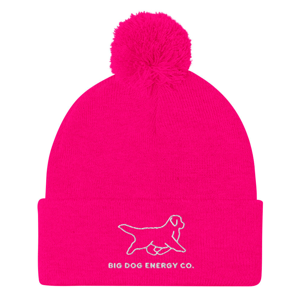 Bright pink cuffed beanie with pom and Big Dog Energy Company logo