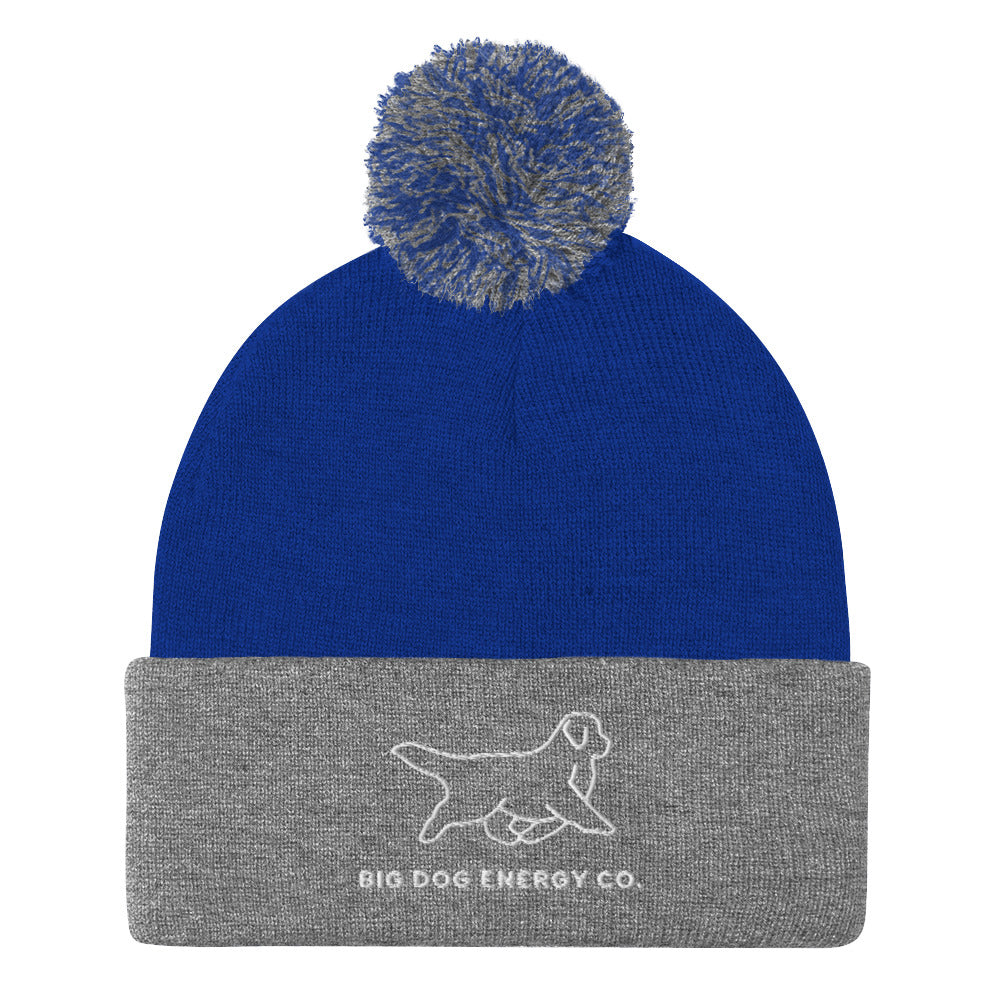 Royal blue winter hat with grey and blue pom and heather grey cuff with Big Dog Energy Company logo