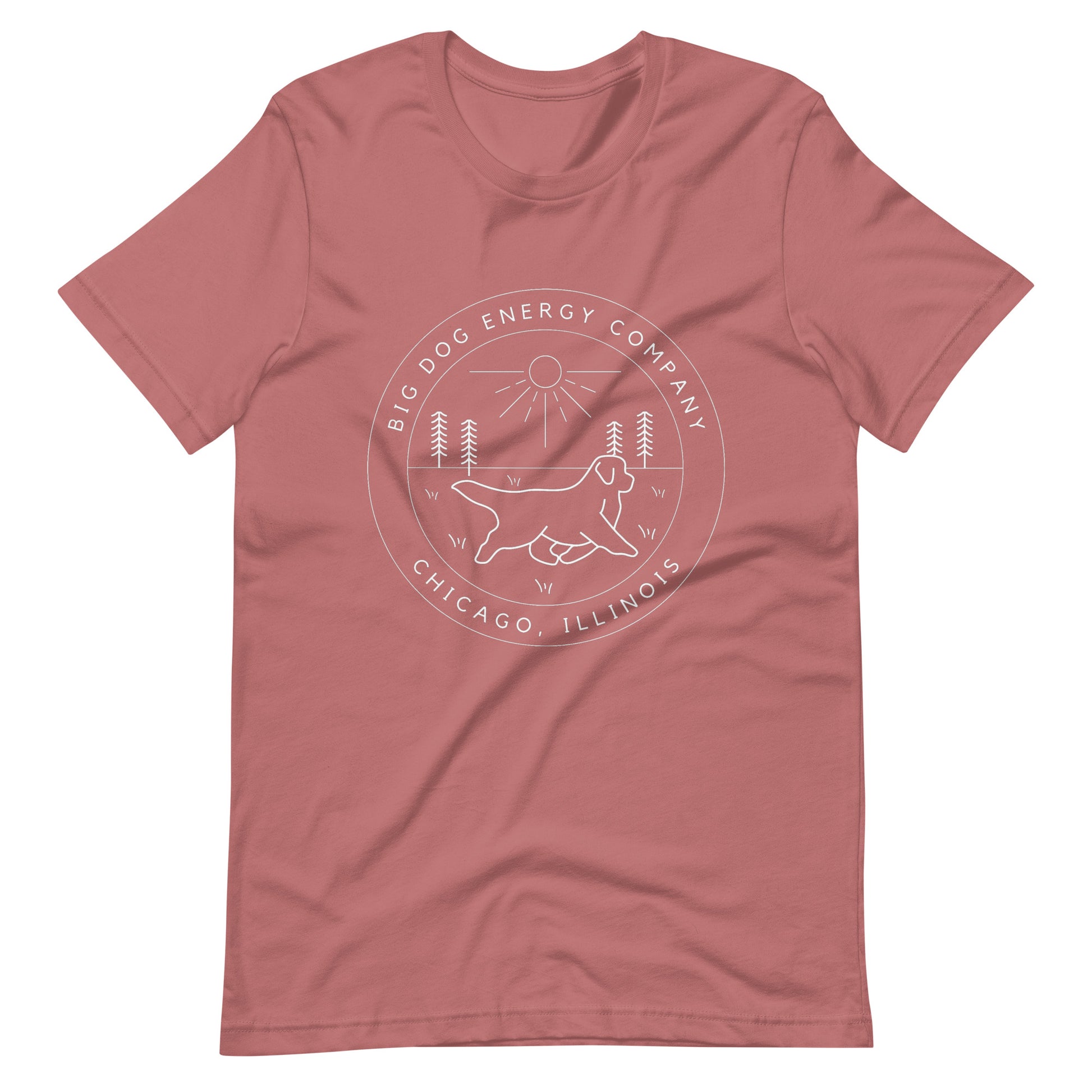 Mauve pink t-shirt with the Big Dog Energy Company summer camp logo, which is white line art of the outline of a Newfoundland dog trotting through grass with primitive trees and a radiant sun in the background. All of this is encased by two concentric circles, with "Big Dog Energy Company, Chicago, Illinois" wrapped around the inside of the circles and surrounding the logo.