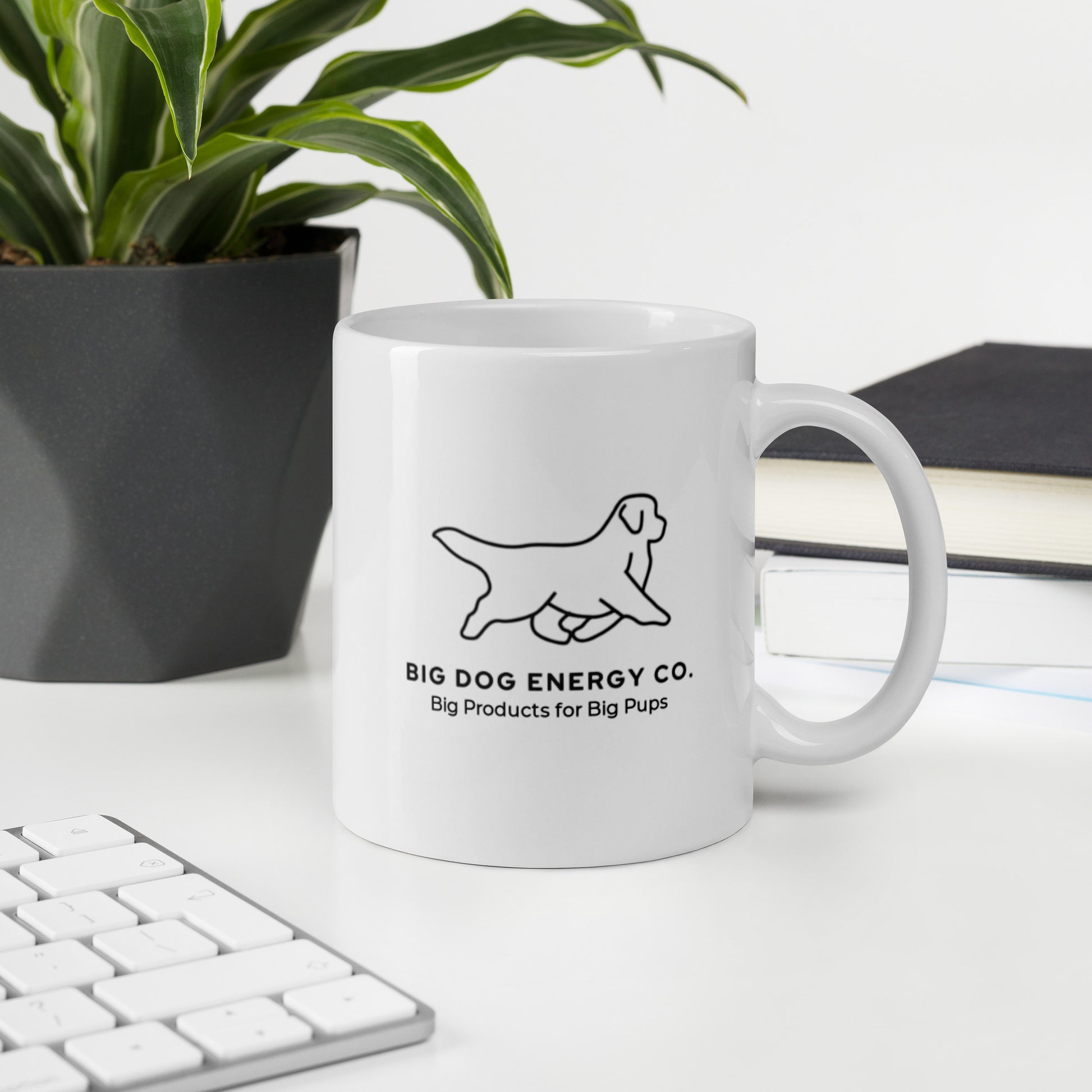 Back side of white 11 oz coffee mug with the Big Dog Energy Company logo and slogan that says "Big Products for Big Pups"