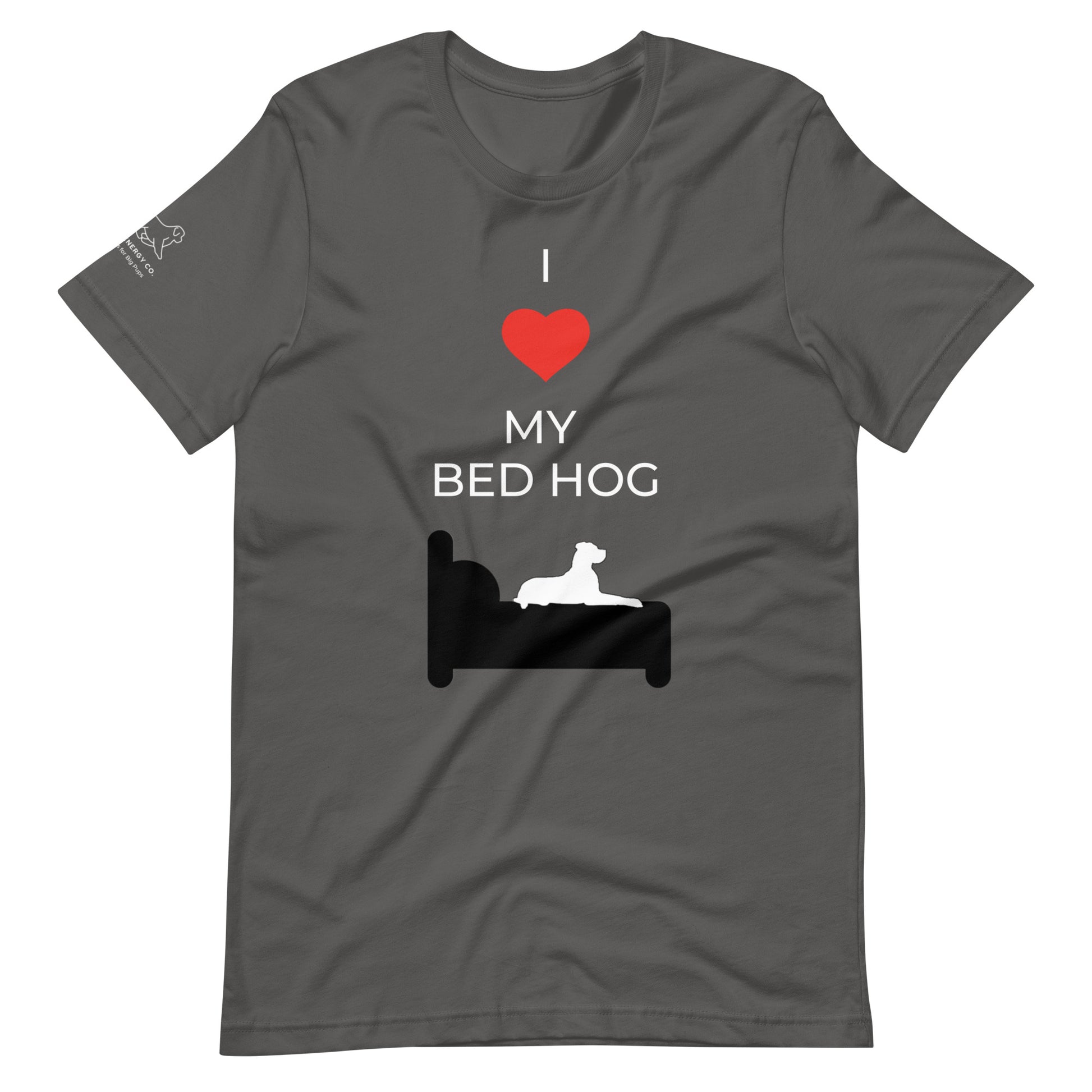Front of an asphalt grey t-shirt that reads "I love my bed hog" in white text over an illustration that is the white silhouette of a large dog laying on the dark silhouette of a bed. The word "love" is replaced by a red heart symbol.