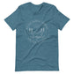 Heather deep teal t-shirt with the Big Dog Energy Company summer camp logo, which is white line art of the outline of a Newfoundland dog trotting through grass with primitive trees and a radiant sun in the background. All of this is encased by two concentric circles, with "Big Dog Energy Company, Chicago, Illinois" wrapped around the inside of the circles and surrounding the logo.