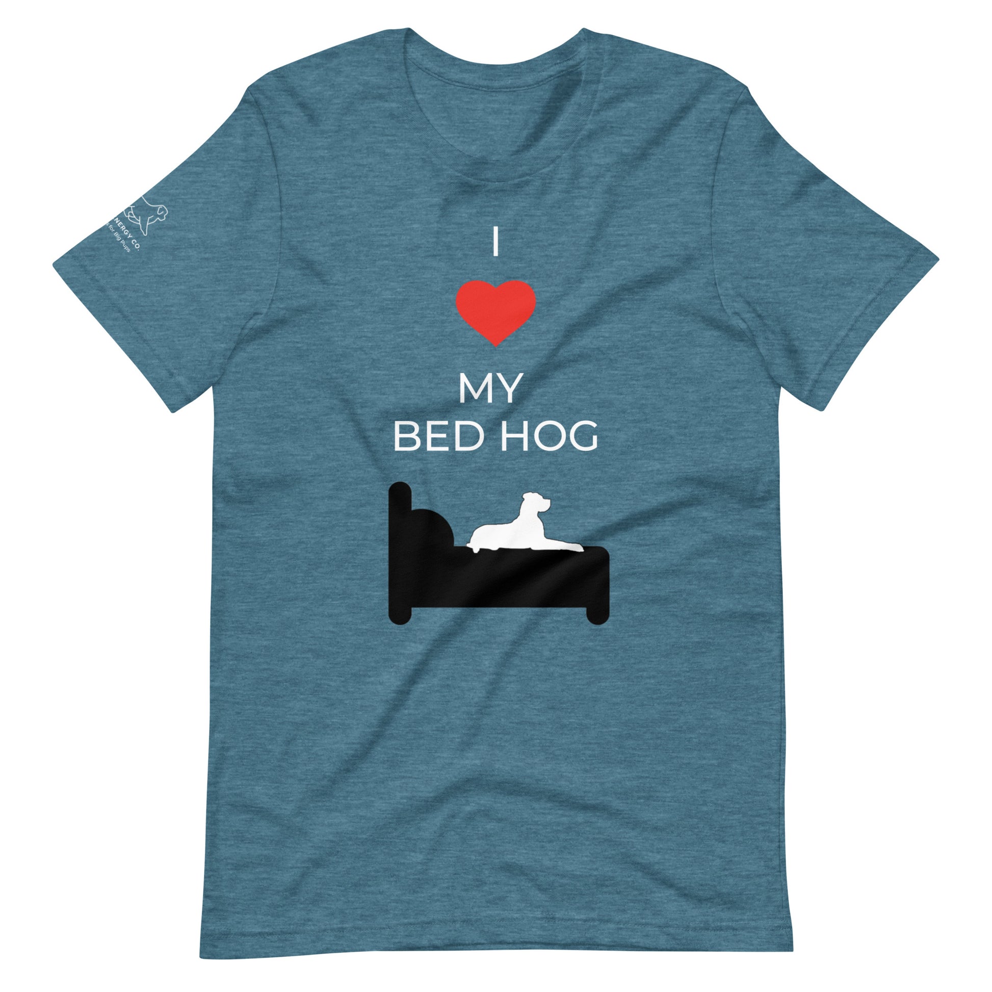 Front of a heather deep teal t-shirt that reads "I love my bed hog" in white text over an illustration that is the white silhouette of a large dog laying on the dark silhouette of a bed. The word "love" is replaced by a red heart symbol.