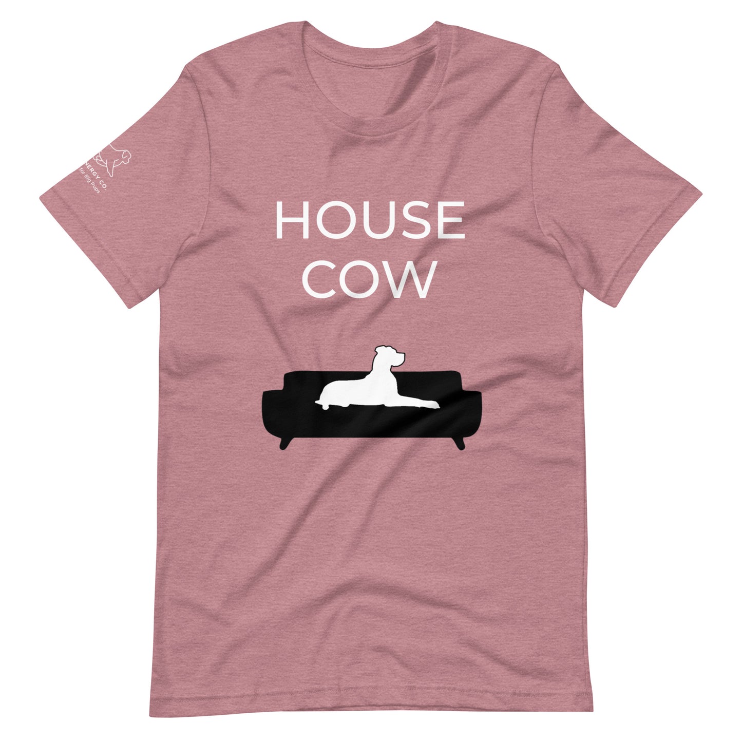 Front of a mauve pink t-shirt that reads "House Cow" in white text over an illustration that is the white silhouette of a large dog laying on the dark silhouette of a couch.