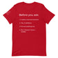 Front of a red t-shirt that has a list that reads "Before you ask: 1. It eats a normal amount. 2. Yes, it slobbers. 3. It's not walking me. 4. No, it doesn't have a saddle." in white text.